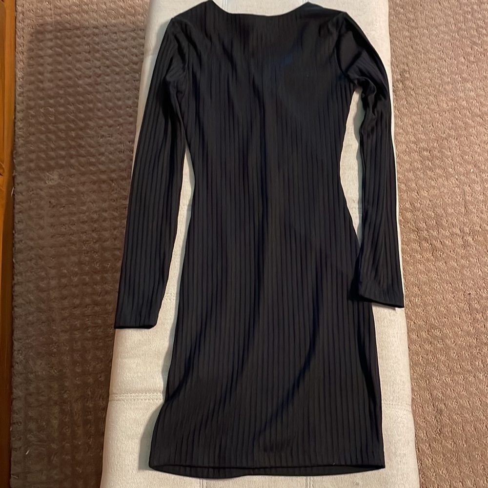NEW Really cute little sexy black dress. Has Chris crossed details on the front - Picture 3 of 8